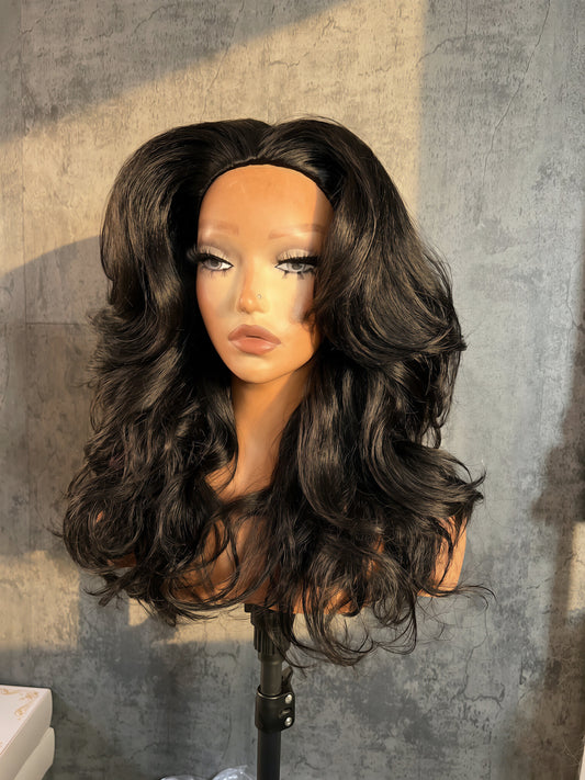 Textured synthetic wig with restored curl pattern after a full week of wear