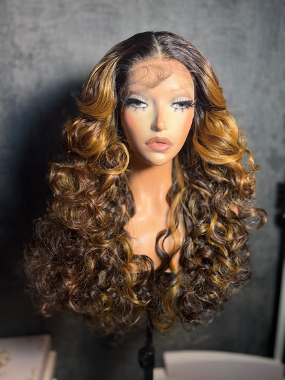 Lenisha 13x7 free part lace front wig in Golden Chestnut, honey highlights on dark roots, 24 inch curls