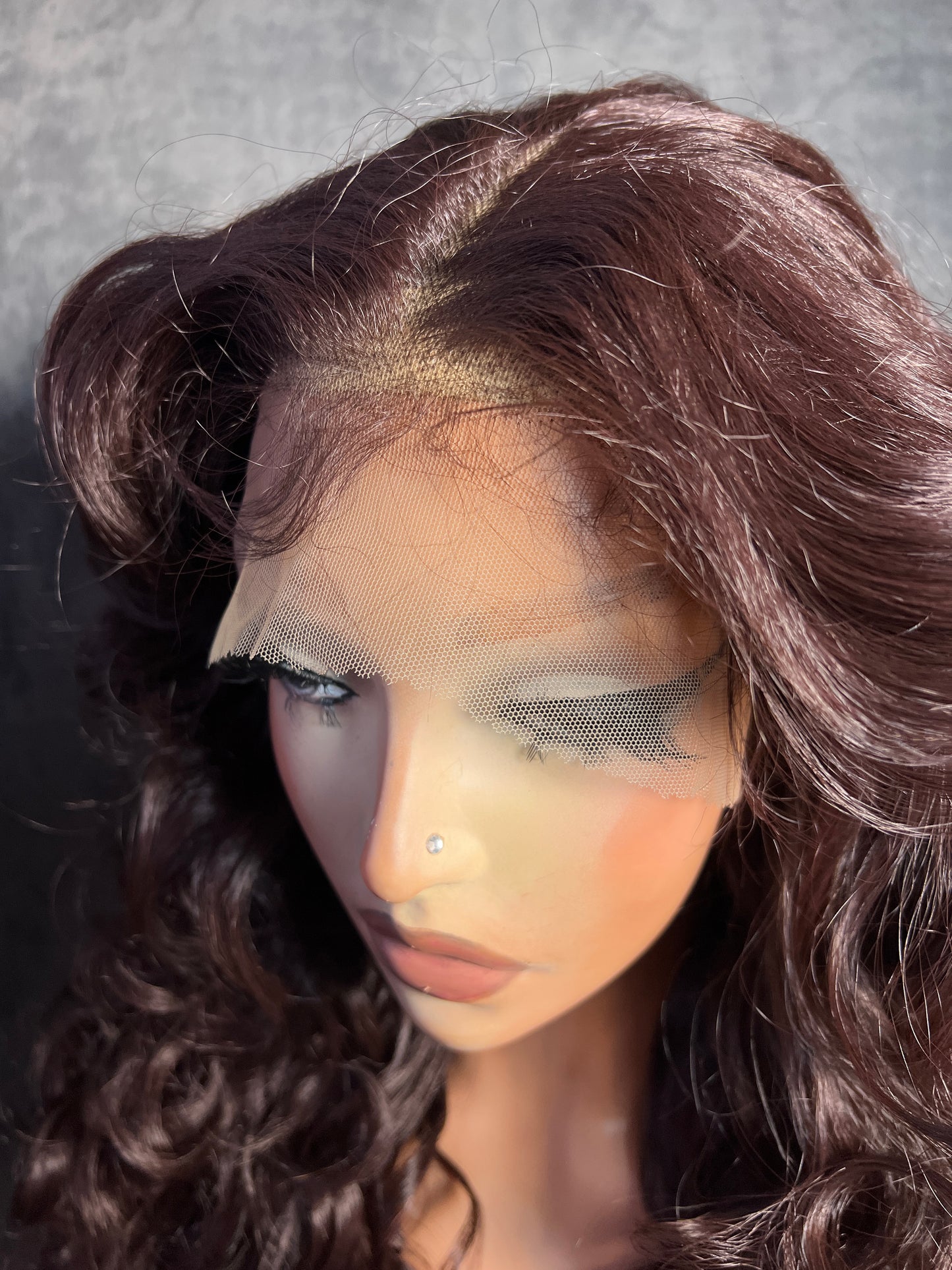 Close-up of the 13x7 free part lace and natural hairline on the Lenisha wig in Cocoa Brunette