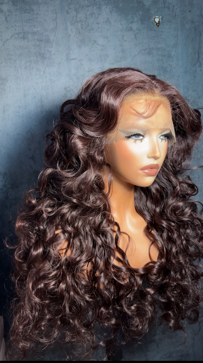 Lenisha 13x7 free part lace front wig in Cocoa Brunette, deep side part, 24 inch curls, side view