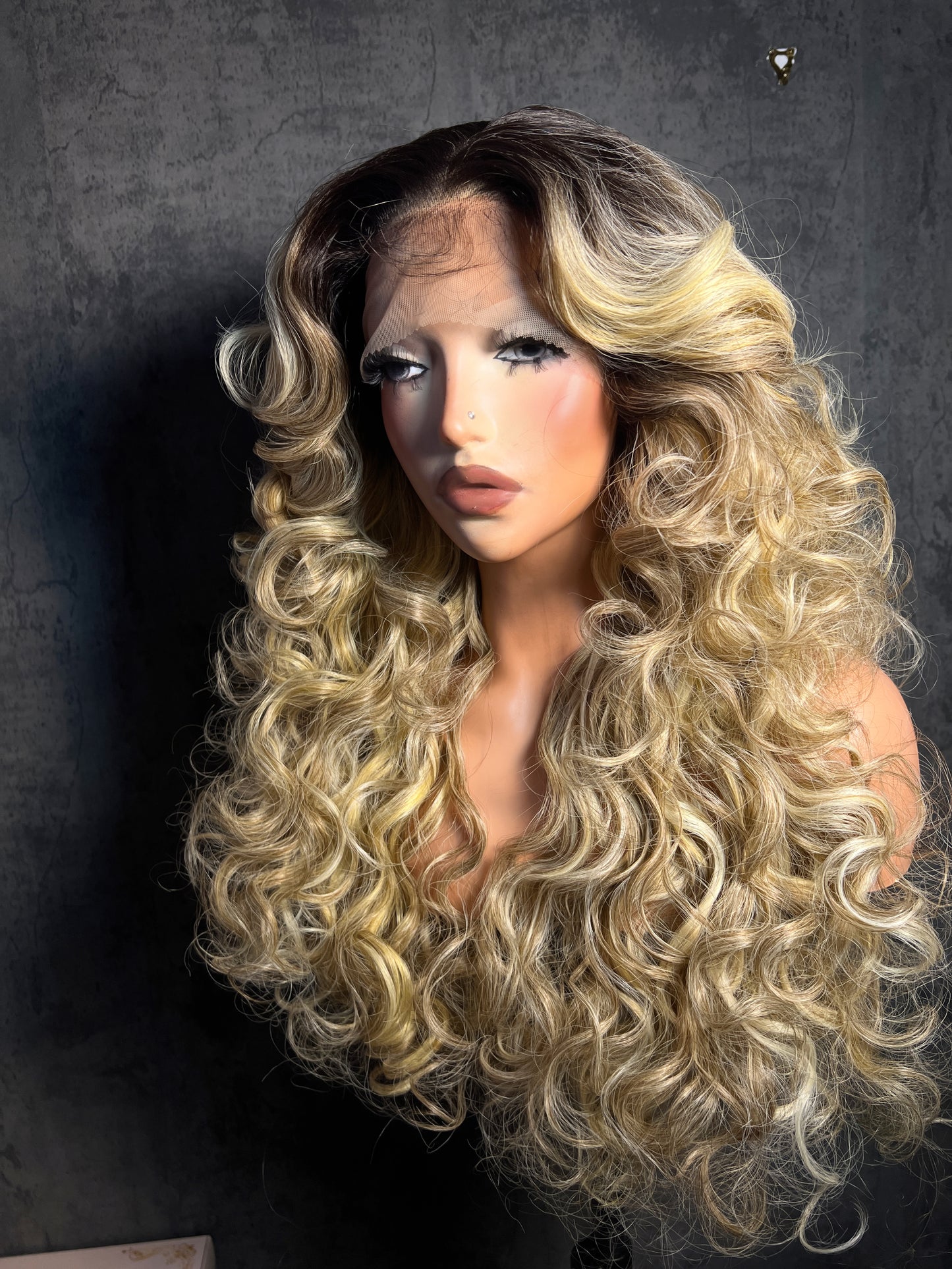 Lenisha 13x7 free part lace front wig in Ash Blonde with dark roots, full 24 inch bouncy curls