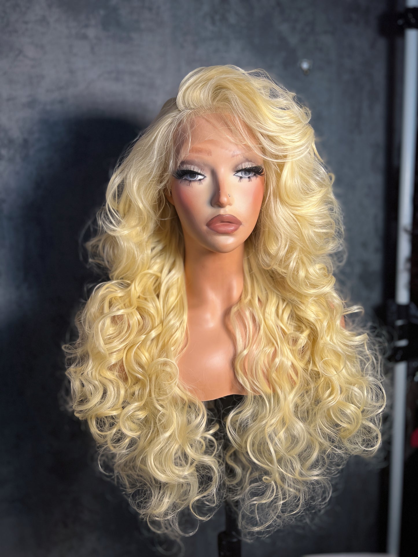 Lenisha 13x7 free part lace front wig in 613 blonde, 24 inch curls, front view