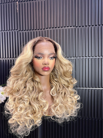Tisha (13 by 7 )Free Part Lace Front Wig